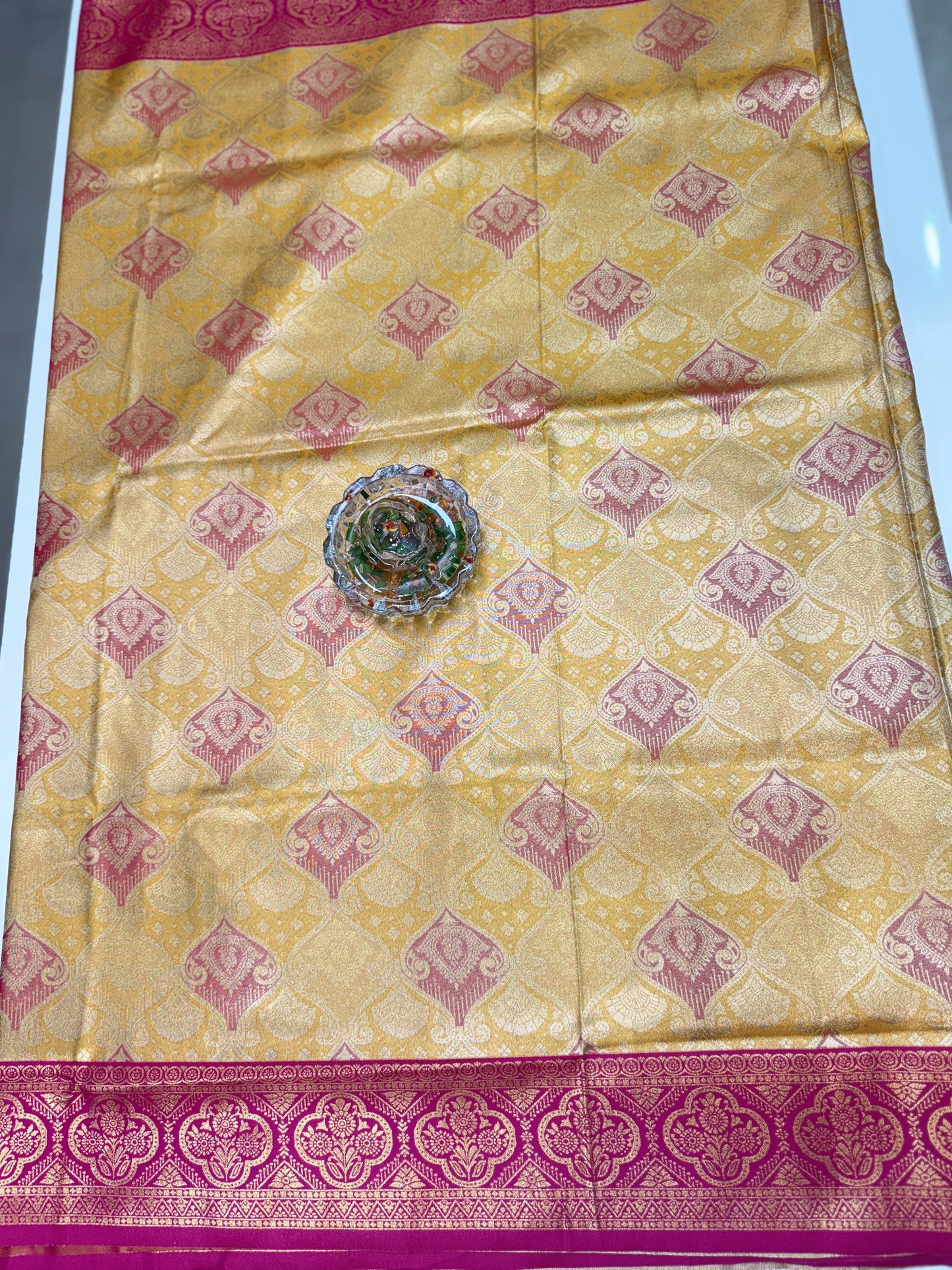 Tissue silk saree with rich zari weaving and contrast border for women