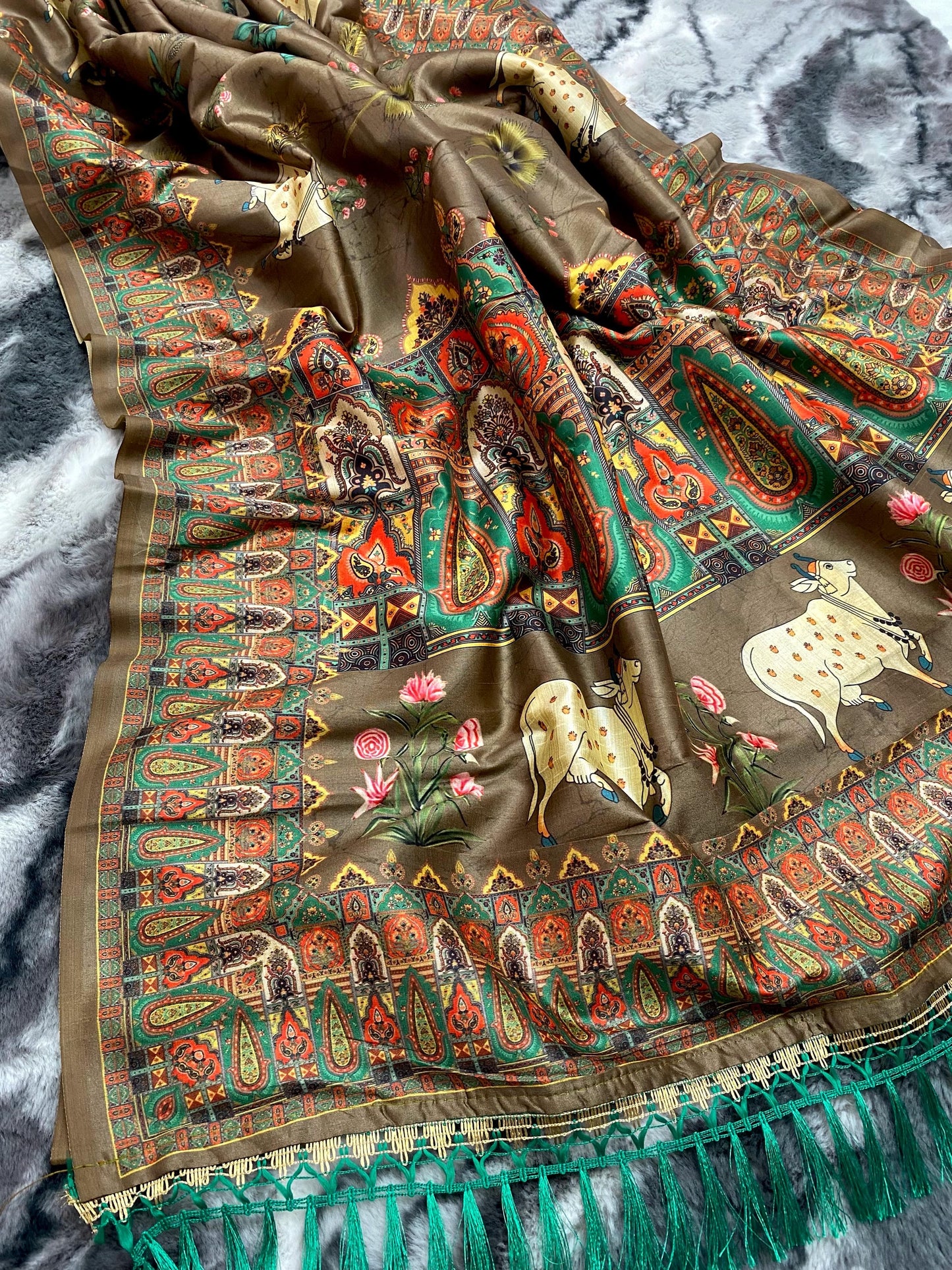 Elegance Redefined: Pichwai Silk Sarees with Tassel Accents