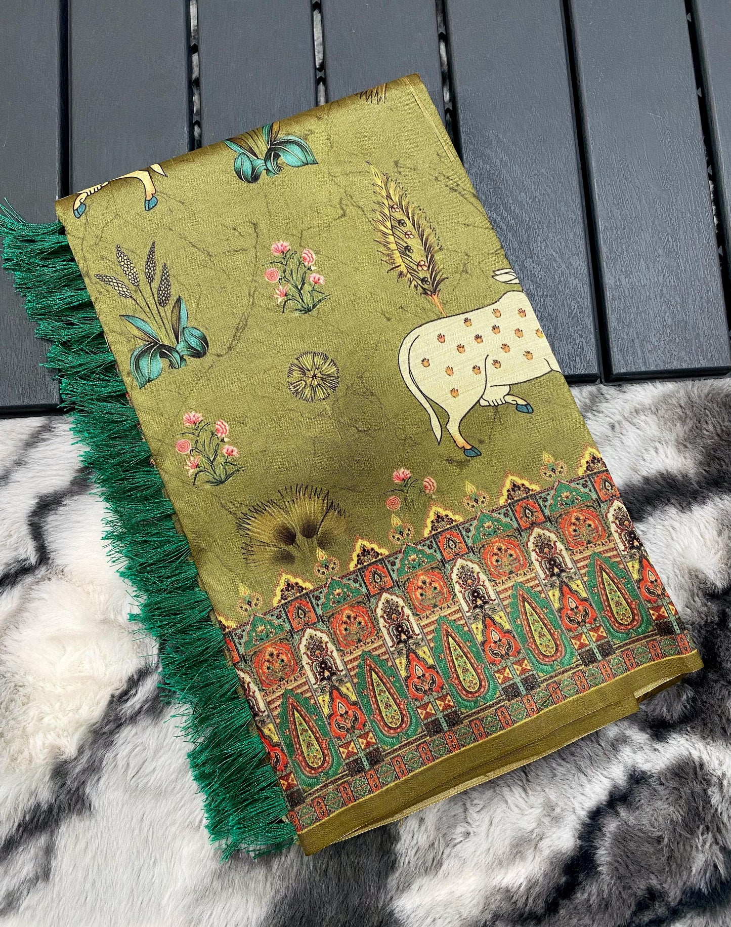 Elegance Redefined: Pichwai Silk Sarees with Tassel Accents