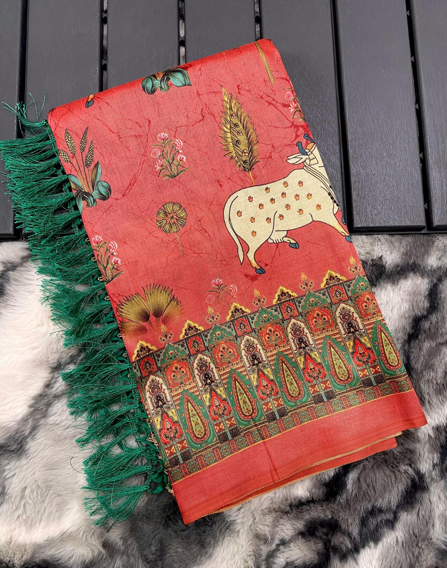 Elegance Redefined: Pichwai Silk Sarees with Tassel Accents