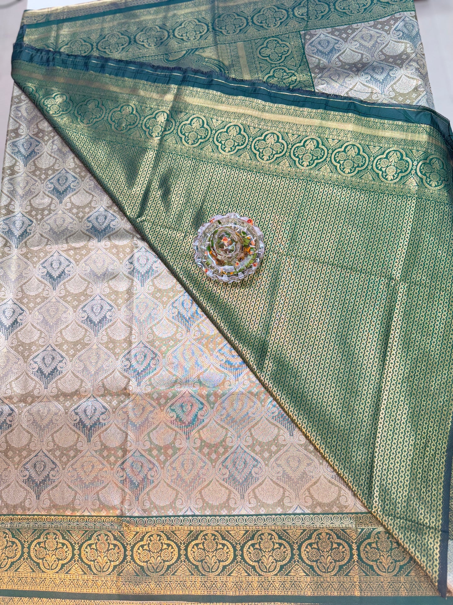 Tissue silk saree with rich zari weaving and contrast border for women