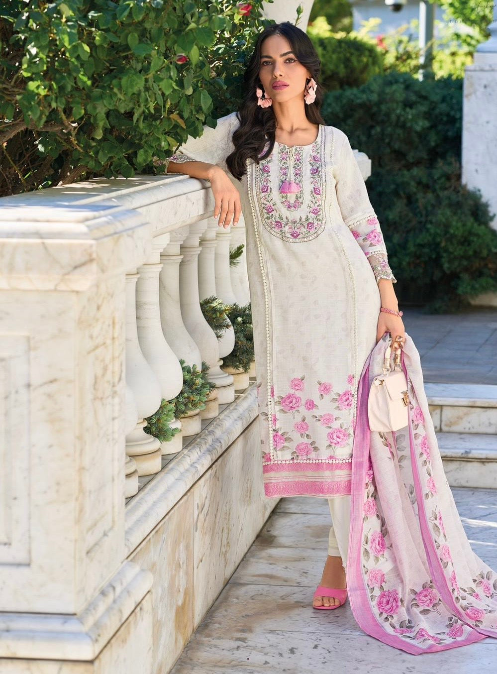 Pure linen fabric with digital prints, pure hand-thread work, and accessory work