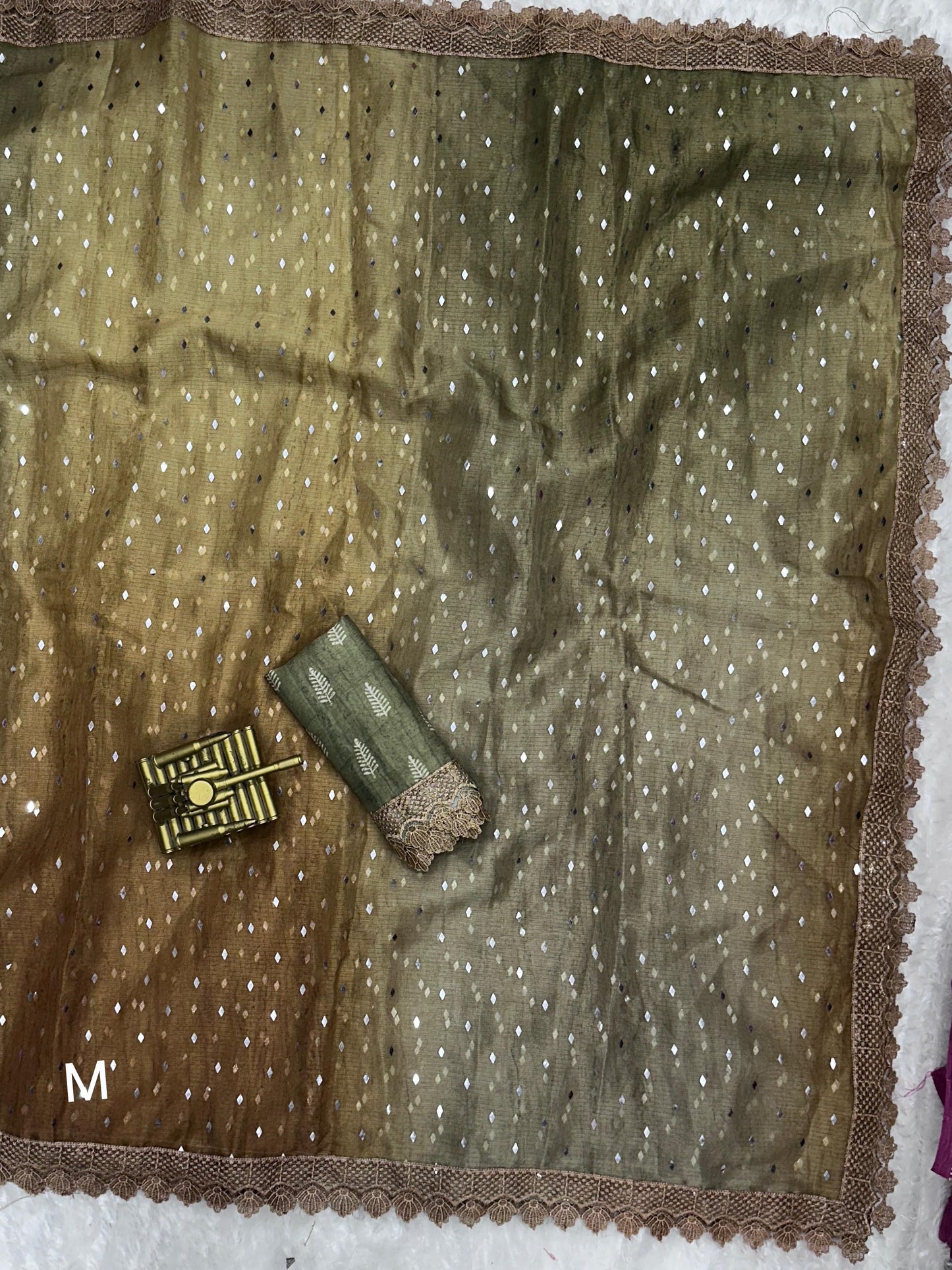Introducing Sunheri: Embrace Your Femininity with Our Glittering Saree