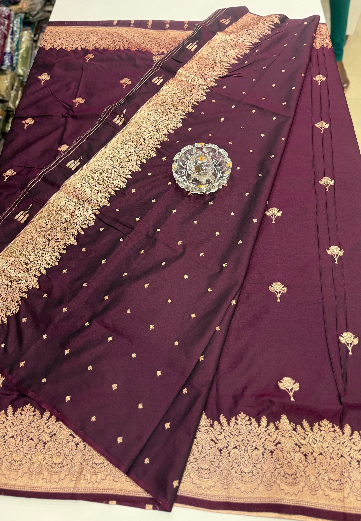 Soft silk saree with woven floral border and contrast brocade blouse piece