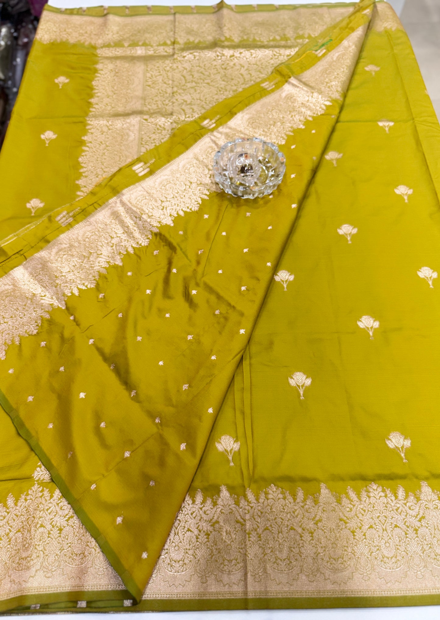 Soft silk saree with woven floral border and contrast brocade blouse piece