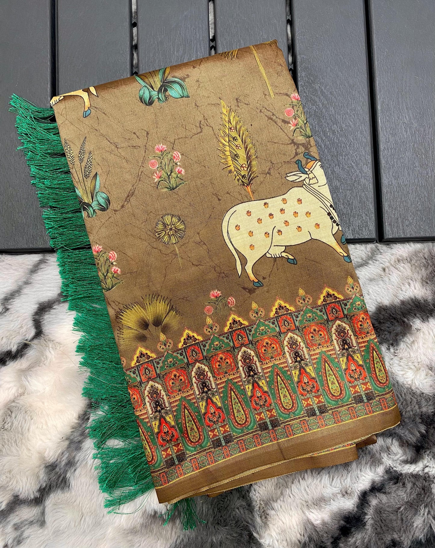 Elegance Redefined: Pichwai Silk Sarees with Tassel Accents
