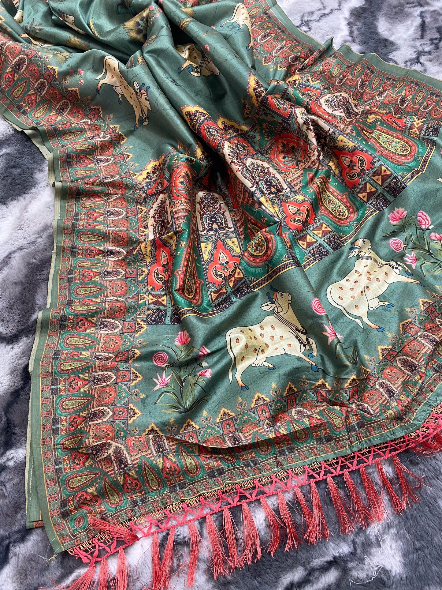 Elegance Redefined: Pichwai Silk Sarees with Tassel Accents