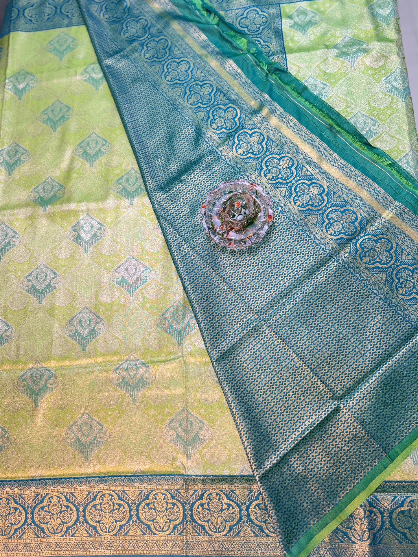 Tissue silk saree with rich zari weaving and contrast border for women