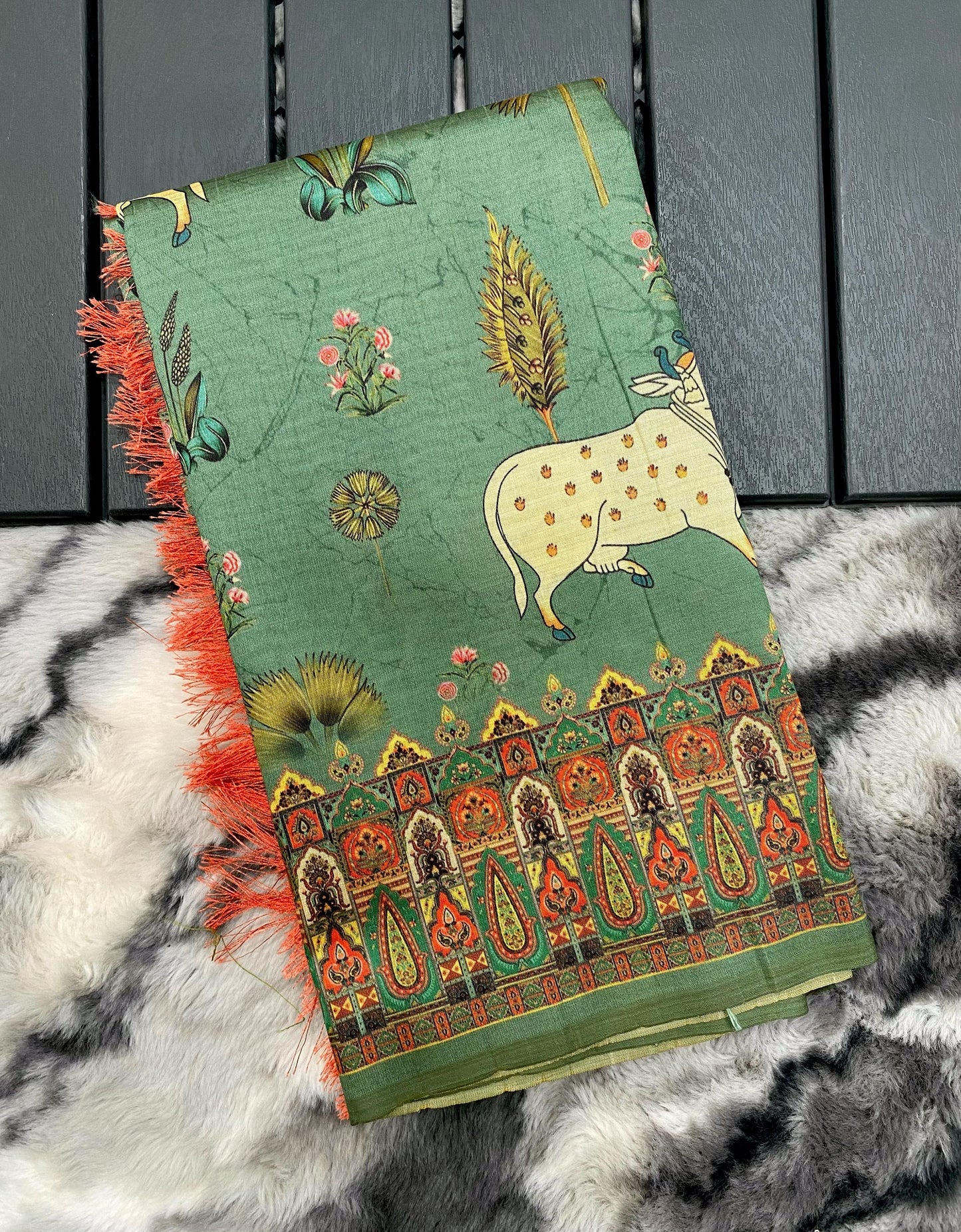 Elegance Redefined: Pichwai Silk Sarees with Tassel Accents