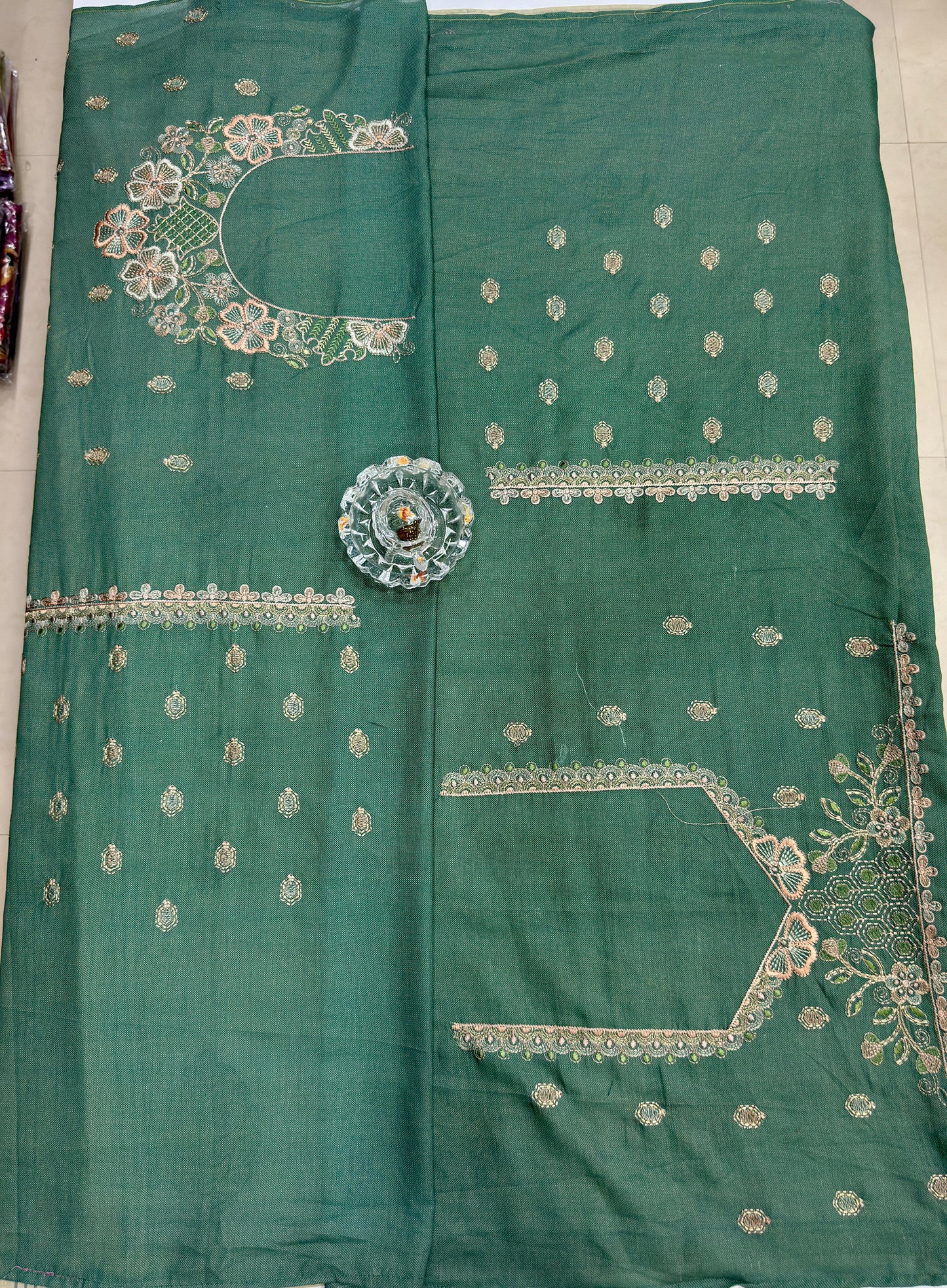 Green kora silk style viscose saree with woven detailing, tassel pallu and embroidered unstitched blouse fabric for women