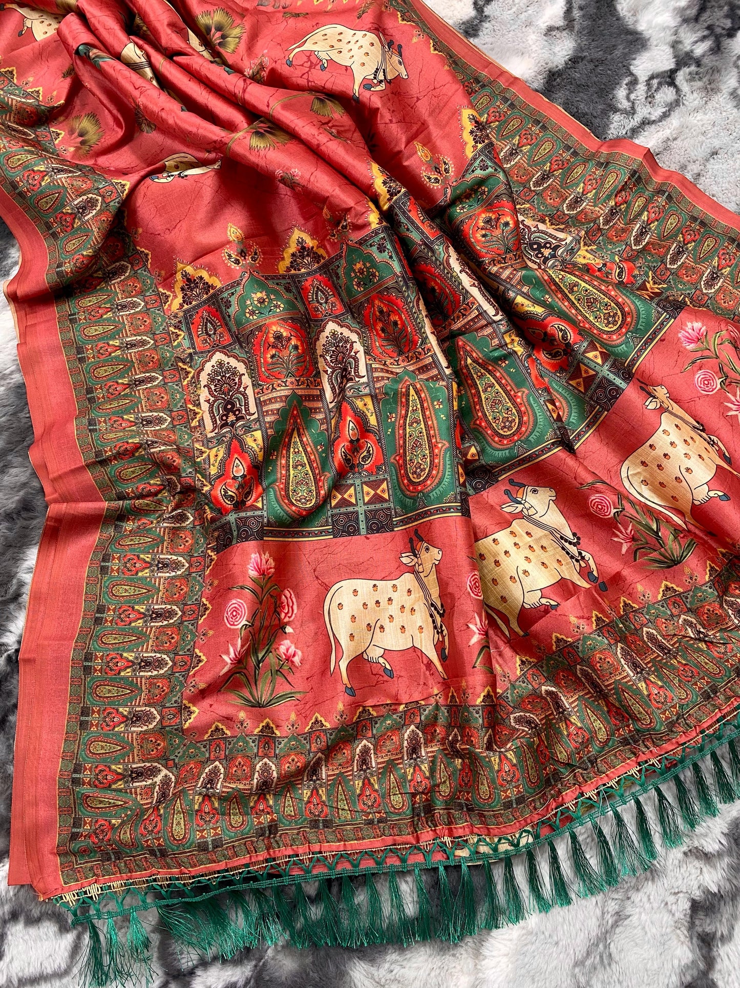 Elegance Redefined: Pichwai Silk Sarees with Tassel Accents