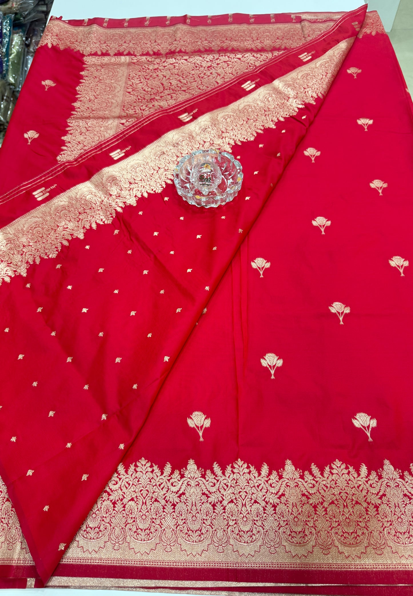 Soft silk saree with woven floral border and contrast brocade blouse piece