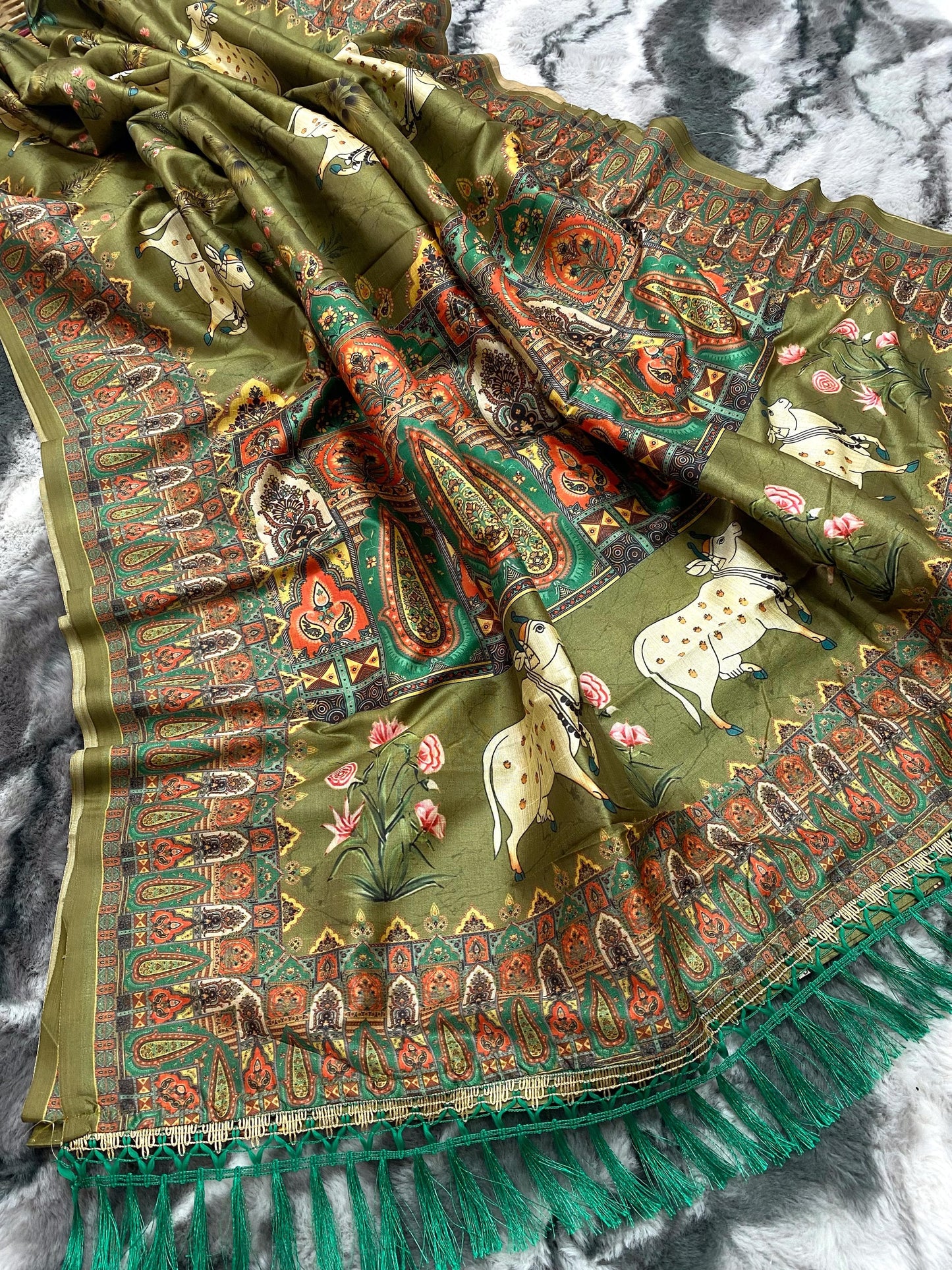 Elegance Redefined: Pichwai Silk Sarees with Tassel Accents