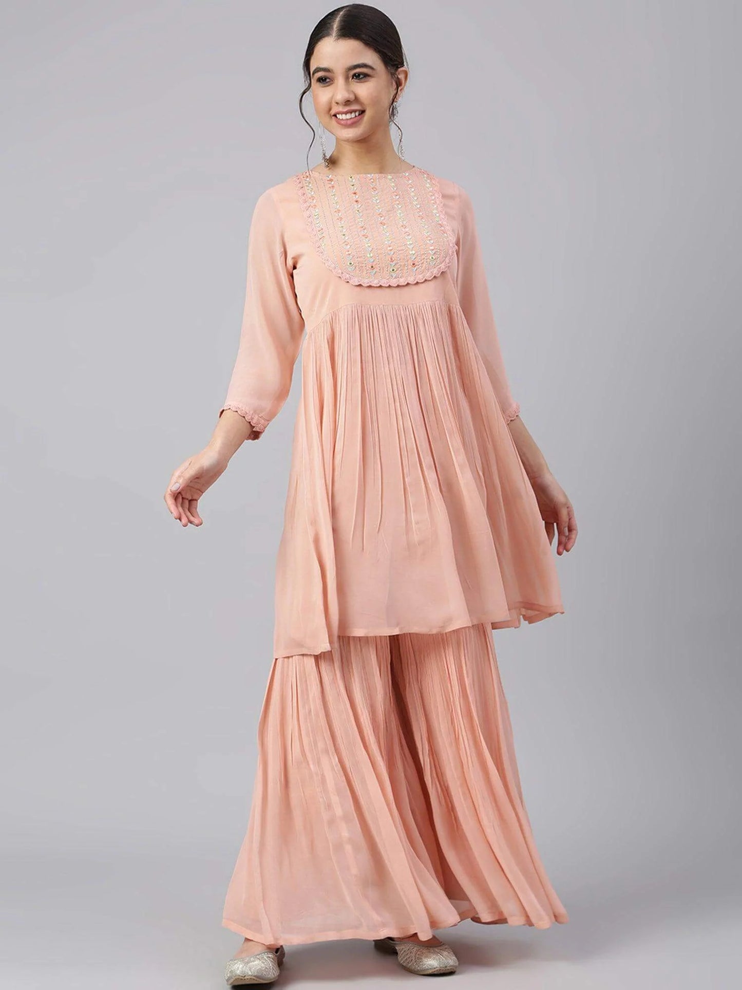 Peach georgette kurta sharara set for women with thread embroidery and flared silhouette – festive ethnic wear