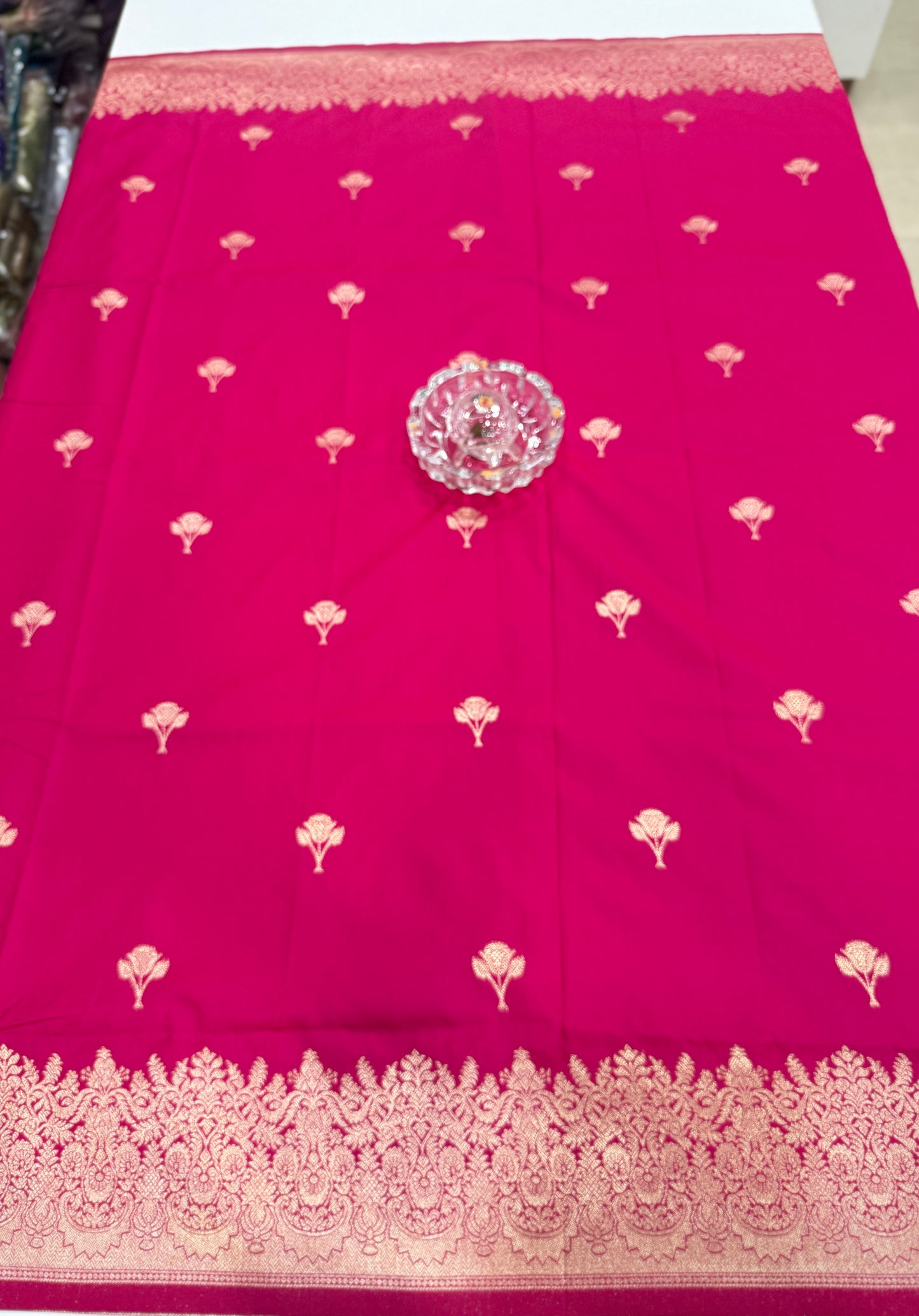 Soft silk saree with woven floral border and contrast brocade blouse piece