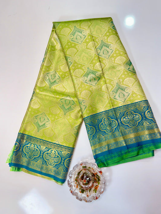 Tissue silk saree with rich zari weaving and contrast border for women