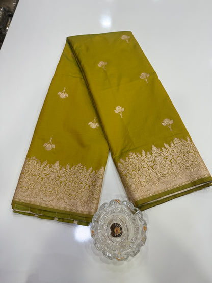 Soft silk saree with woven floral border and contrast brocade blouse piece