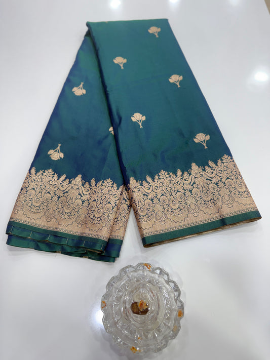 Soft silk saree with woven floral border and contrast brocade blouse piece