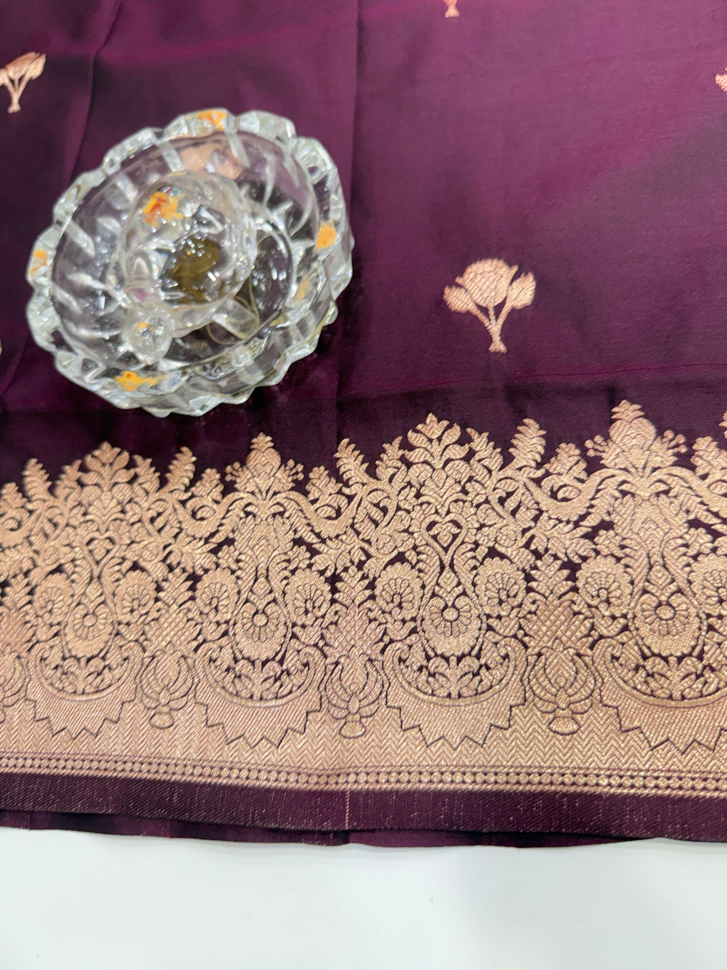 Soft silk saree with woven floral border and contrast brocade blouse piece