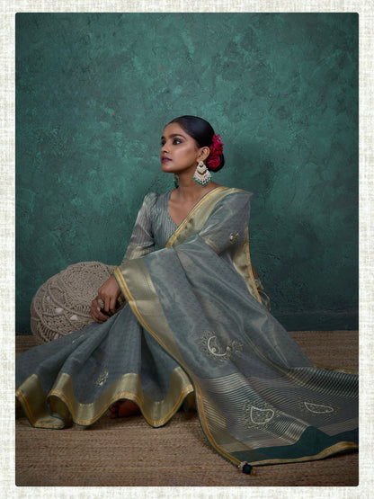 linen tissue saree with handwork motifs, lace detailing, and designer blouse – lightweight ethnic wear for women