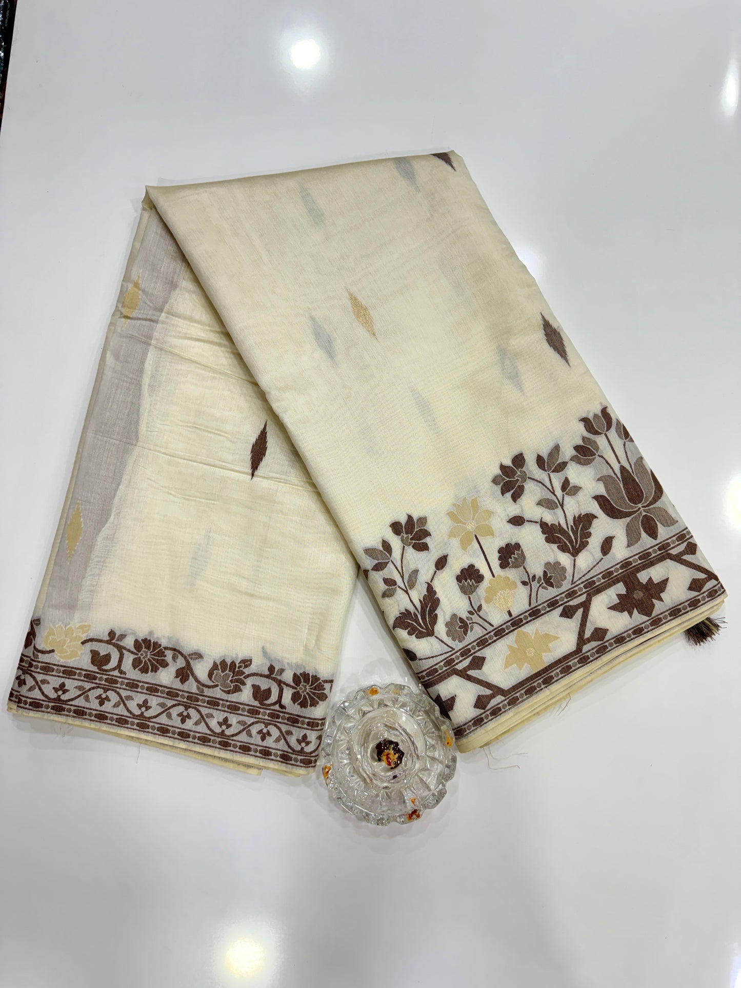 Ivory beige kora silk style viscose saree with woven motifs, tassel pallu and embroidered blouse fabric for women