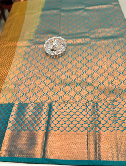 Kanchipuram Style Silk Saree with Rich Zari Border – Festive Wear