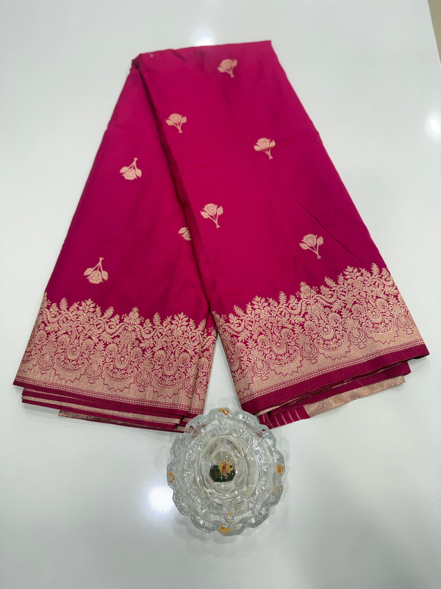 Soft silk saree with woven floral border and contrast brocade blouse piece