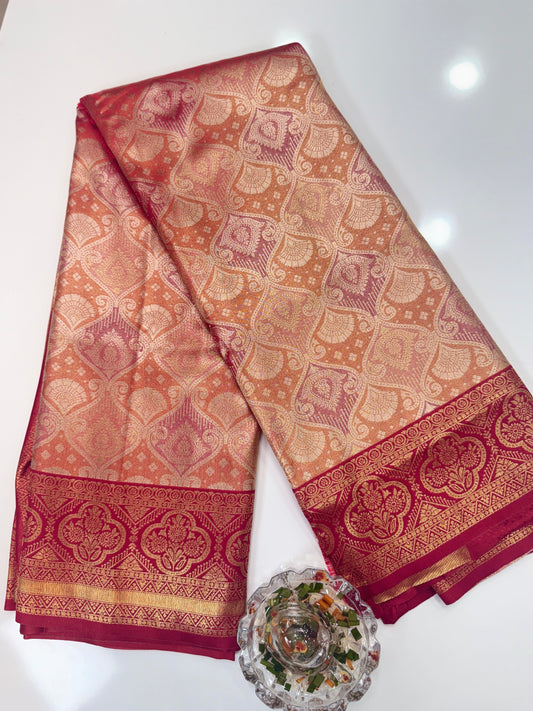 Tissue silk saree with rich zari weaving and contrast border for women