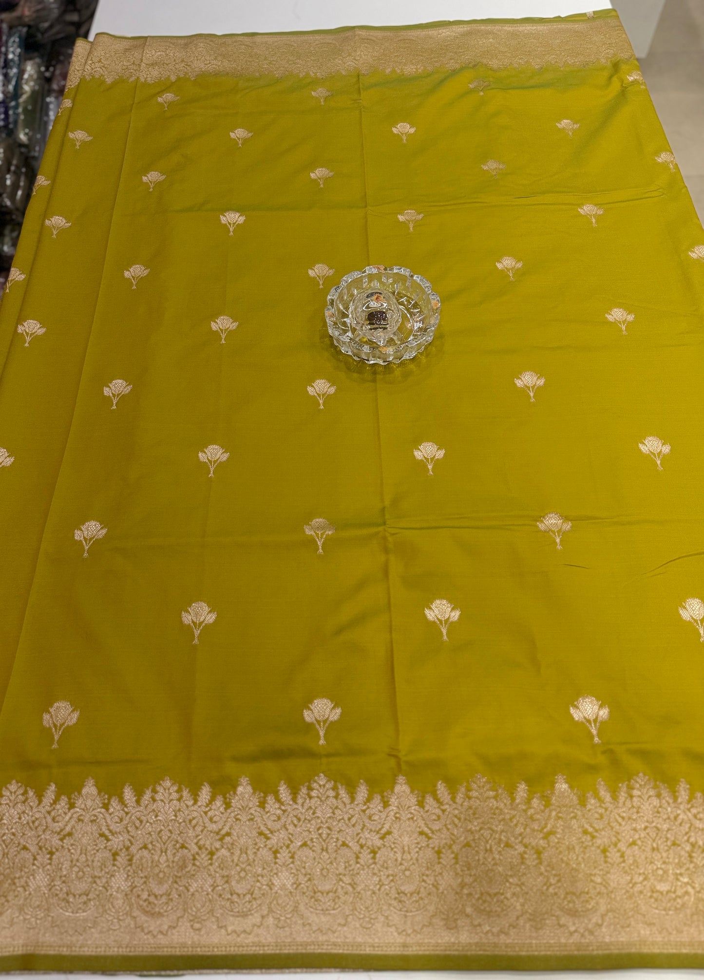 Soft silk saree with woven floral border and contrast brocade blouse piece