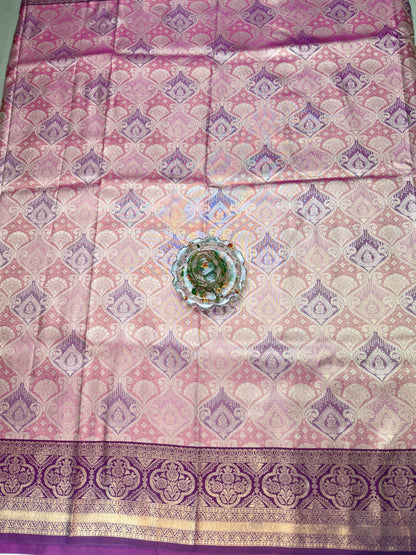 Tissue silk saree with rich zari weaving and contrast border for women