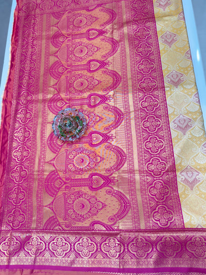Tissue silk saree with rich zari weaving and contrast border for women