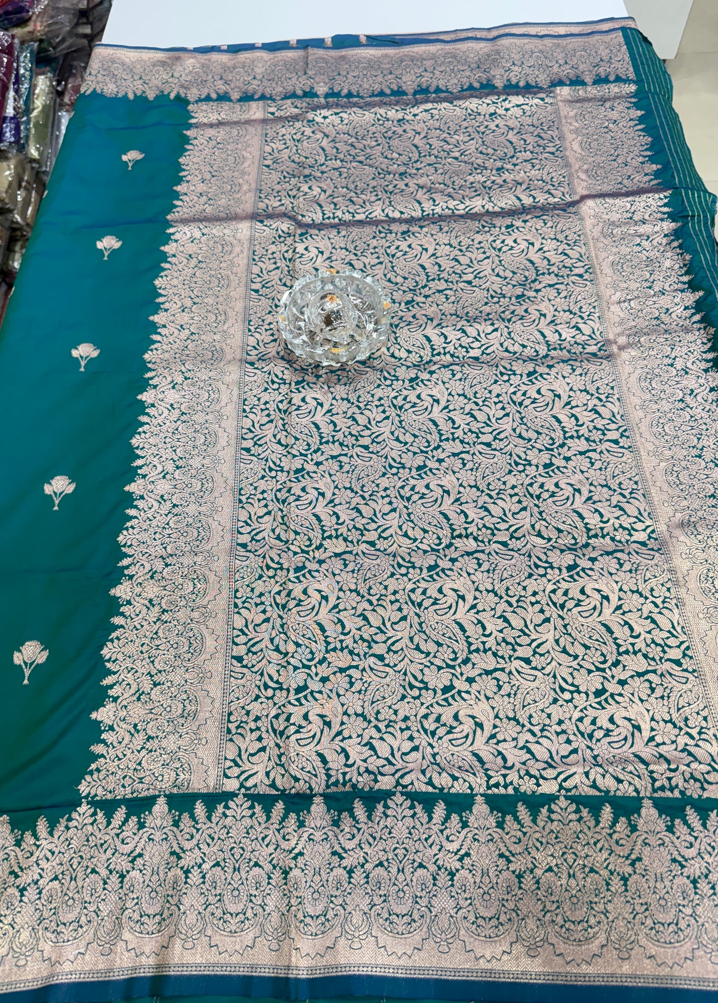 Soft silk saree with woven floral border and contrast brocade blouse piece