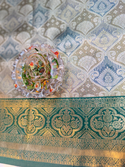 Tissue silk saree with rich zari weaving and contrast border for women