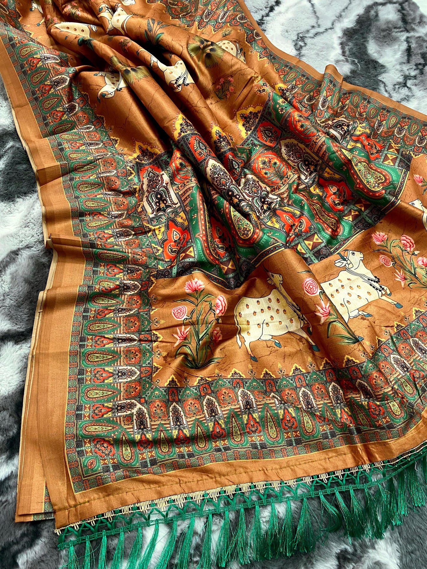 Elegance Redefined: Pichwai Silk Sarees with Tassel Accents