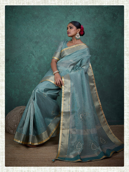 linen tissue saree with handwork motifs, lace detailing, and designer blouse – lightweight ethnic wear for women