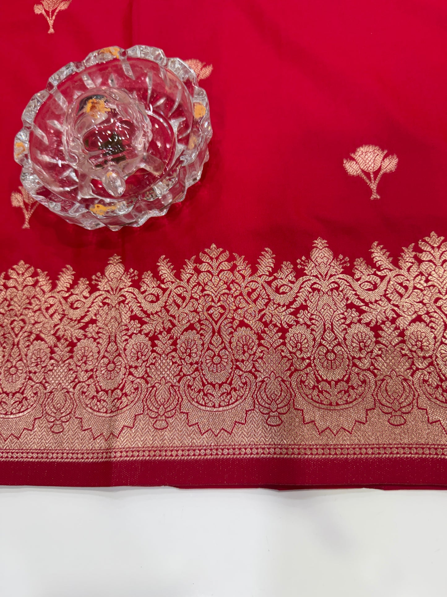 Soft silk saree with woven floral border and contrast brocade blouse piece