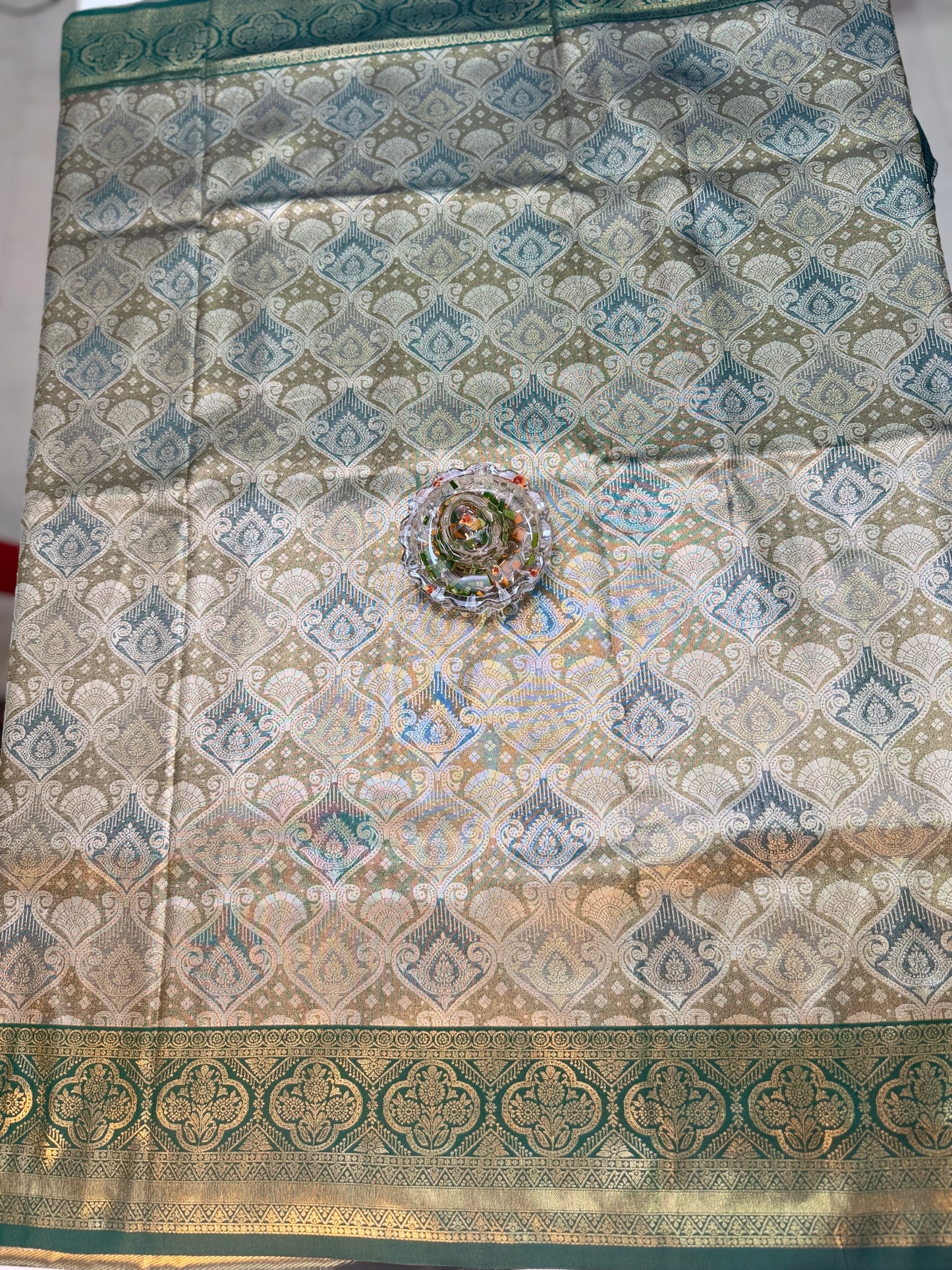 Tissue silk saree with rich zari weaving and contrast border for women