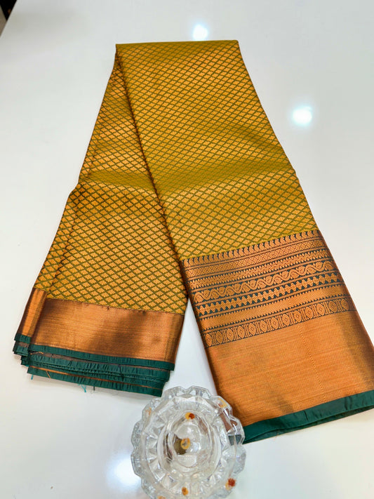Kanchipuram Style Silk Saree with Rich Zari Border – Festive Wear