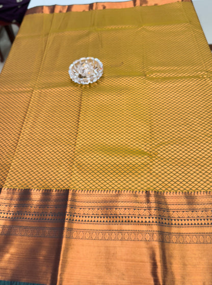 Kanchipuram Style Silk Saree with Rich Zari Border – Festive Wear