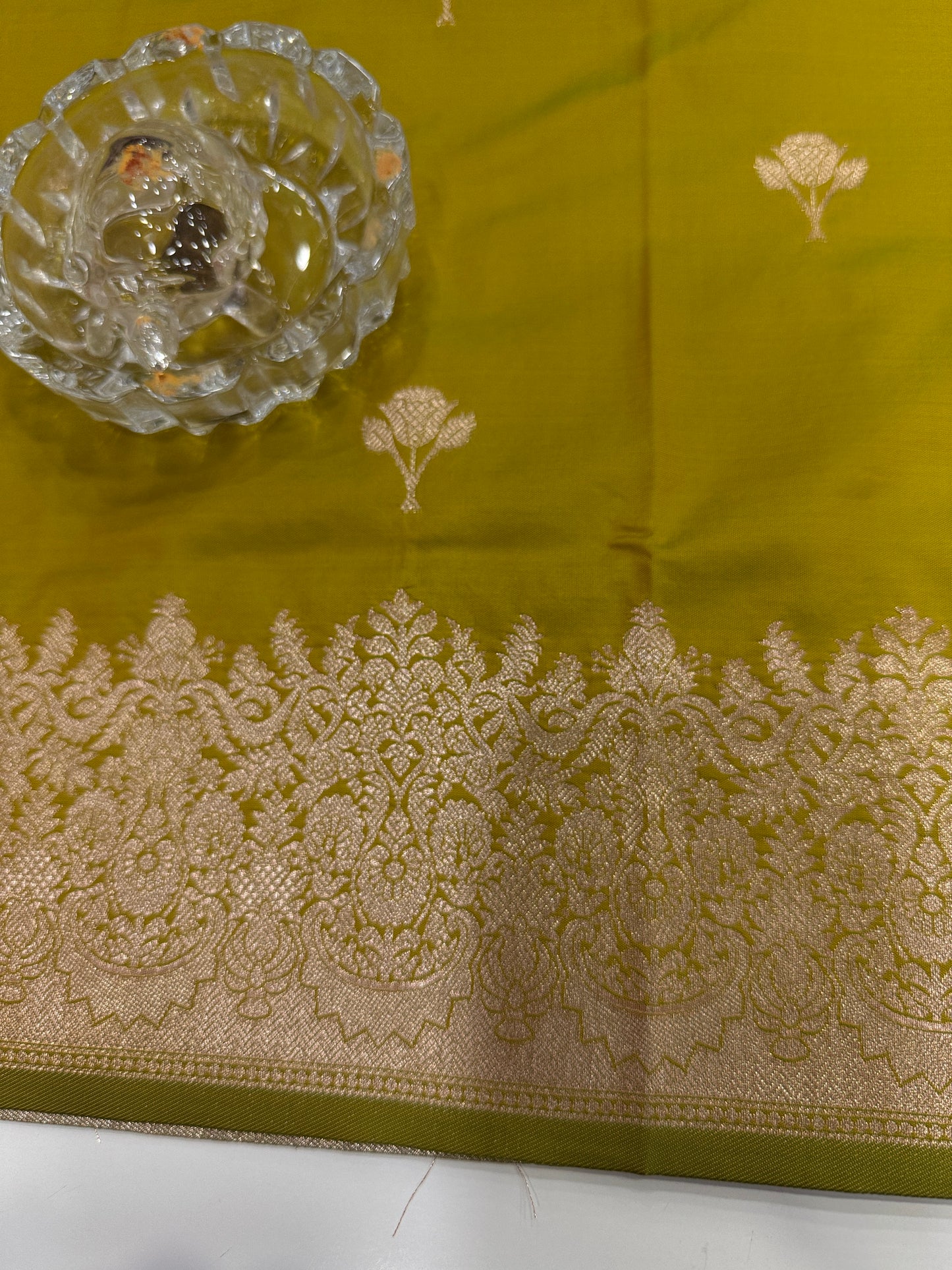 Soft silk saree with woven floral border and contrast brocade blouse piece