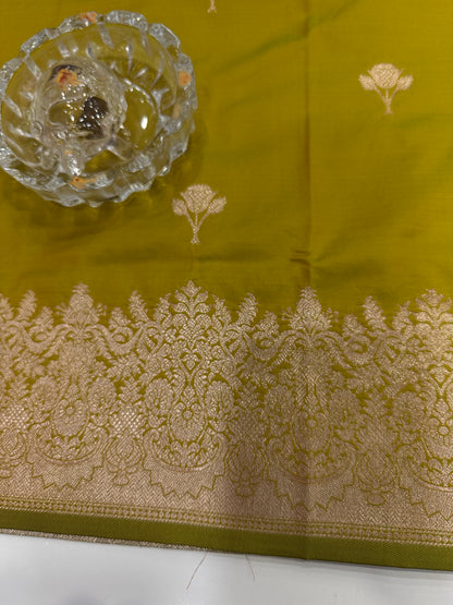 Soft silk saree with woven floral border and contrast brocade blouse piece