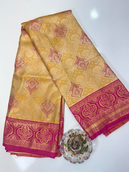 Tissue silk saree with rich zari weaving and contrast border for women