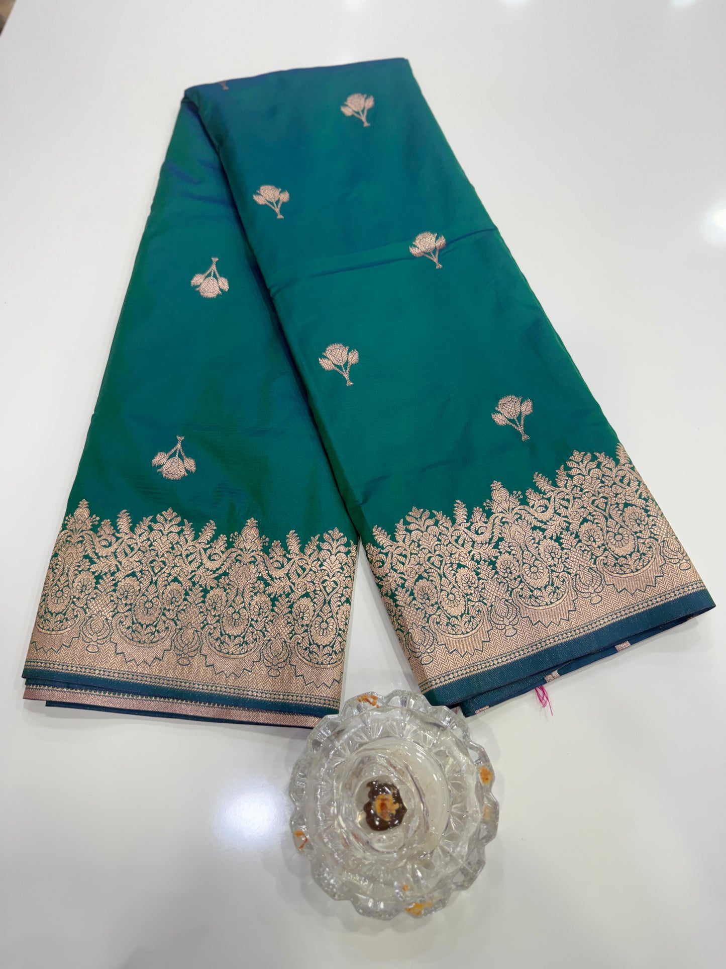 Soft silk saree with woven floral border and contrast brocade blouse piece