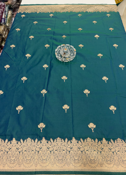 Soft silk saree with woven floral border and contrast brocade blouse piece