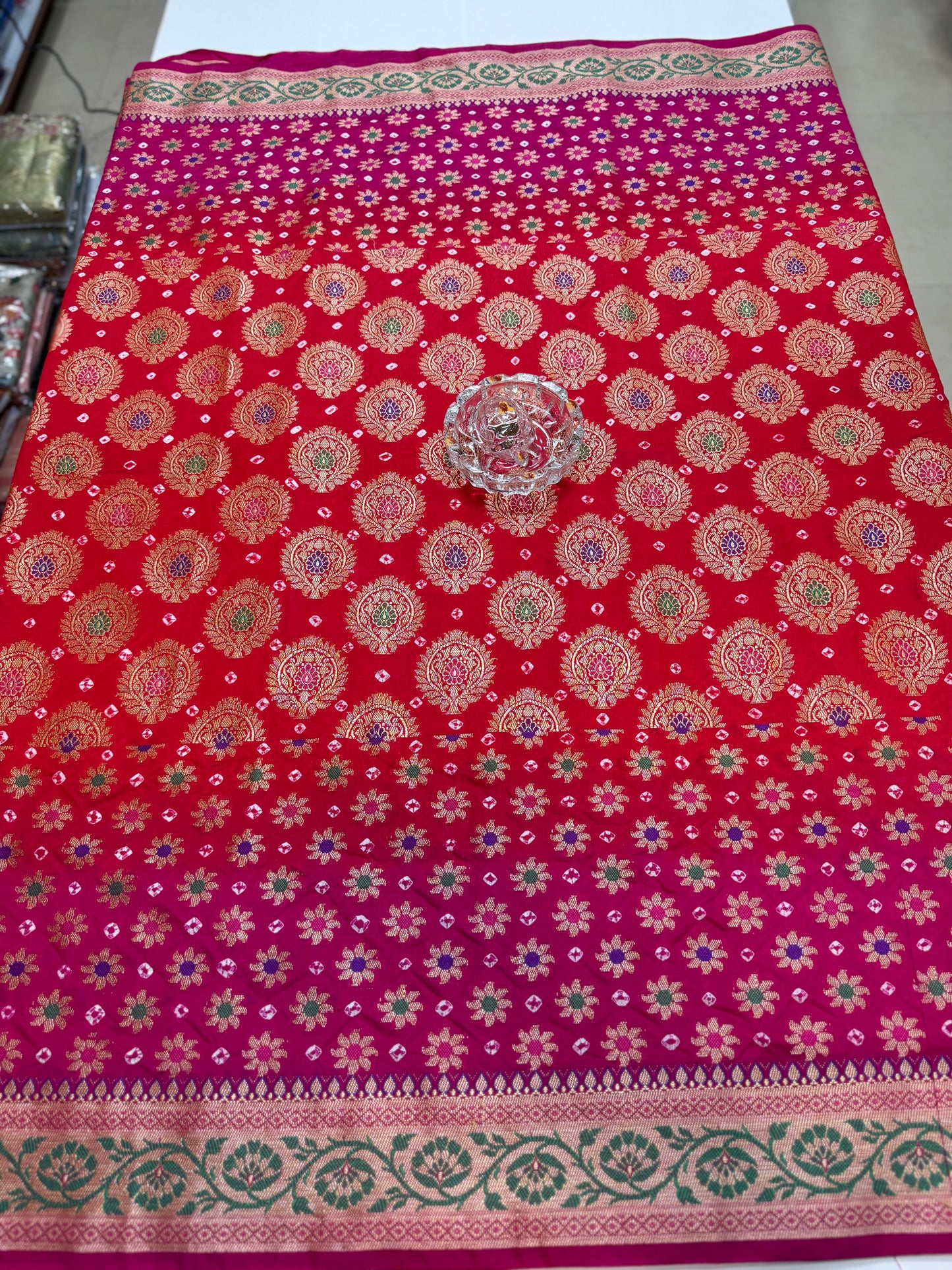 Banarasi dupiyan bandhani saree with semi-weaving neemjari work and hand chunri craftsmanship