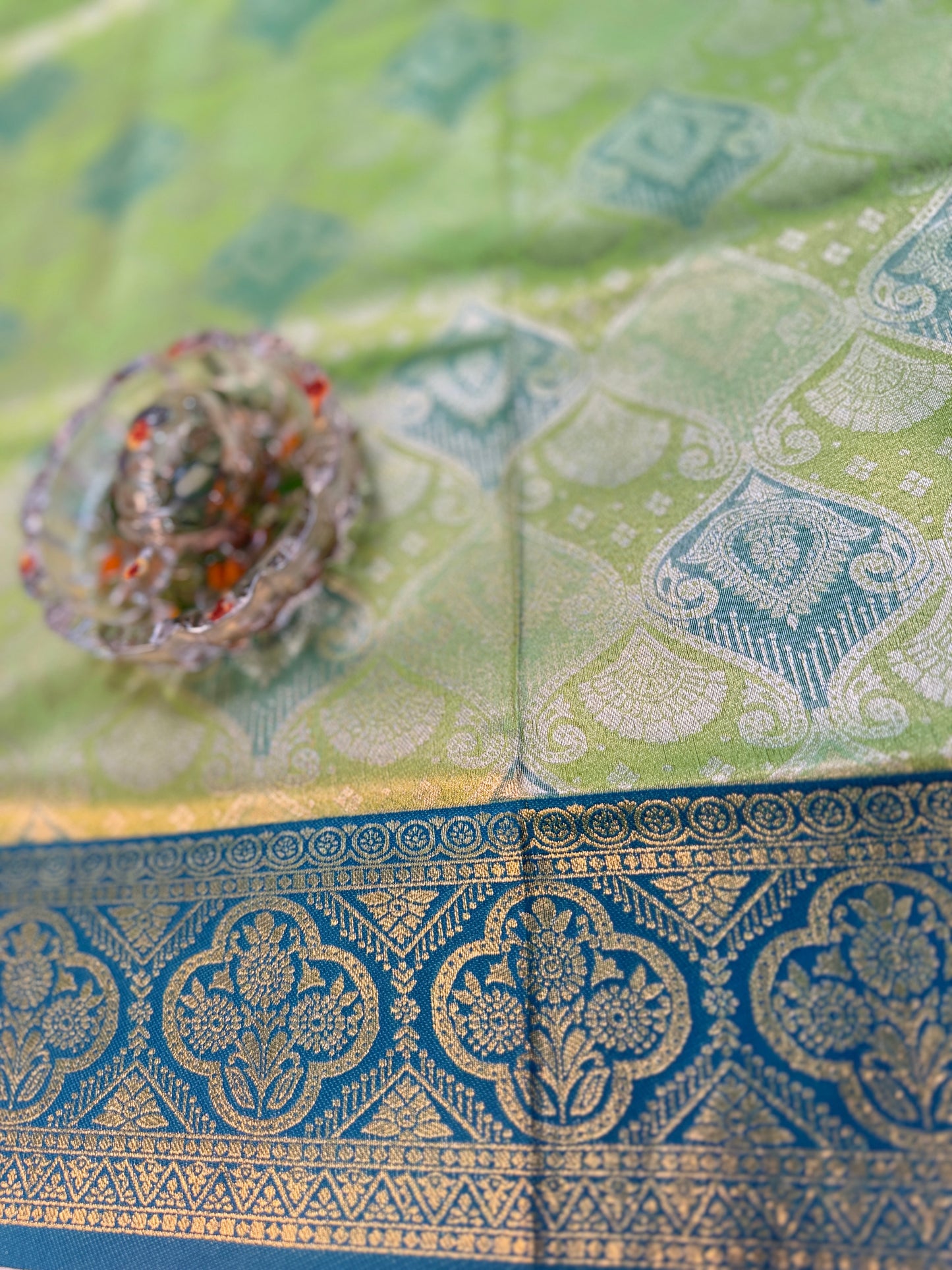 Tissue silk saree with rich zari weaving and contrast border for women