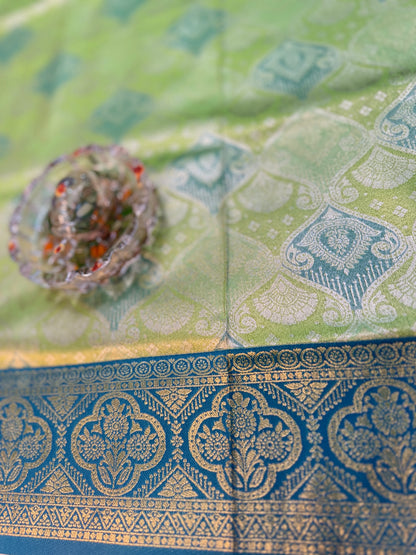 Tissue silk saree with rich zari weaving and contrast border for women