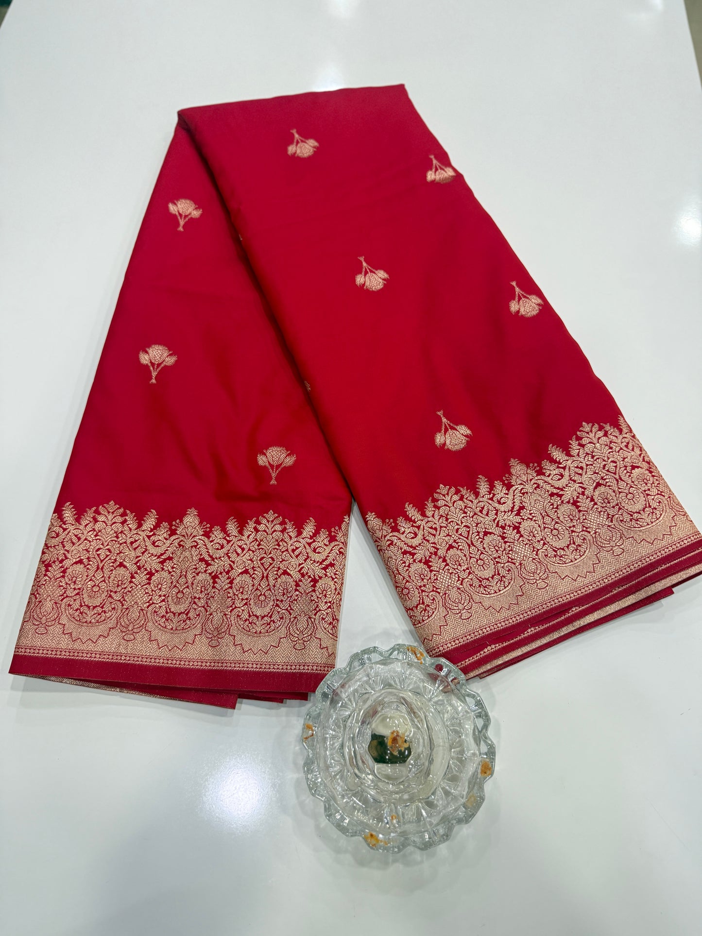 Soft silk saree with woven floral border and contrast brocade blouse piece
