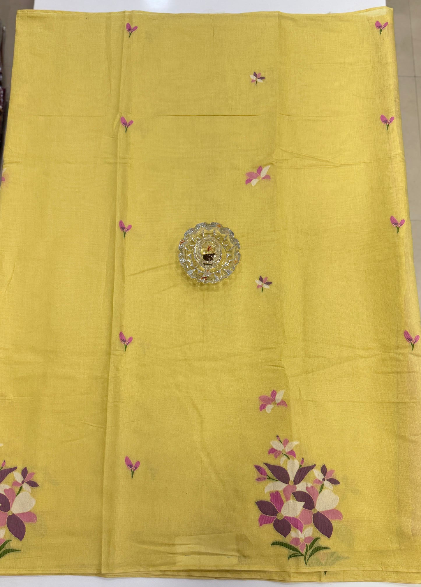 Yellow kora silk style viscose saree with woven floral motifs, tassel pallu and embroidered unstitched blouse fabric for women