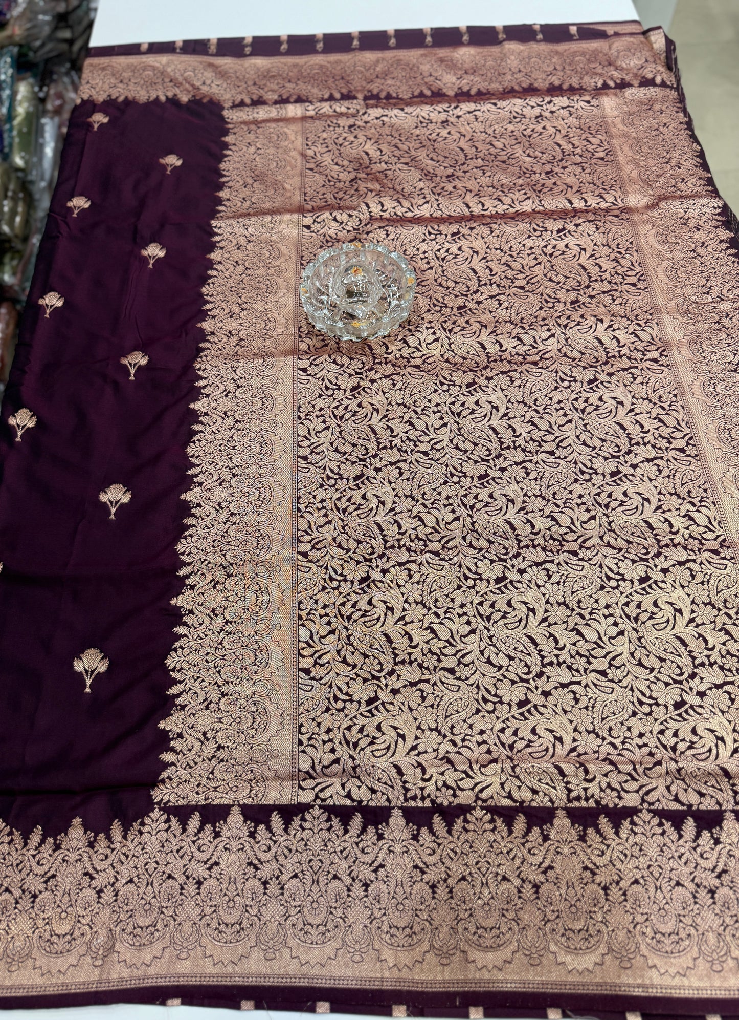 Soft silk saree with woven floral border and contrast brocade blouse piece